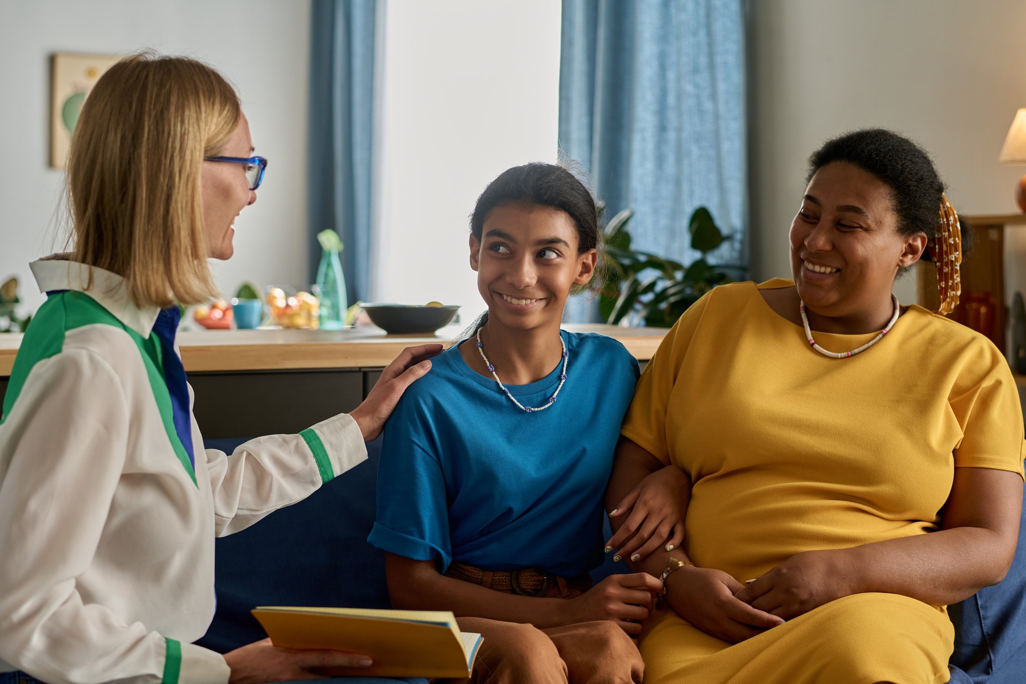 social-worker-talking-to-family-2023-12-15-00-20-36-utc